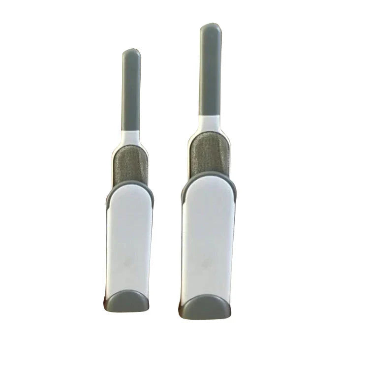 A reusable pet hair remover comb with a self-cleaning base, perfect for removing fur and lint from sofas, chairs, and other upholstery.