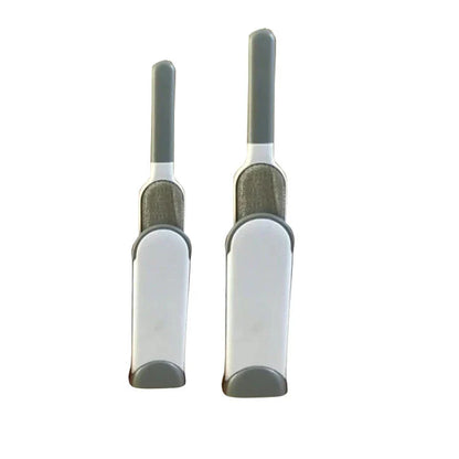 A reusable pet hair remover comb with a self-cleaning base, perfect for removing fur and lint from sofas, chairs, and other upholstery.