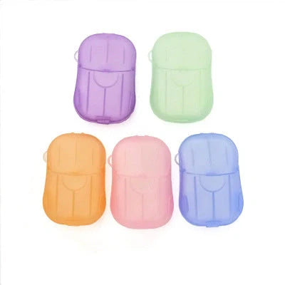 Compact disposable hand soap sheets in various colors, perfect for travel hygiene.