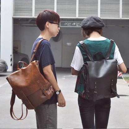 Durable PU leather backpack with spacious storage and laptop compartment for modern men