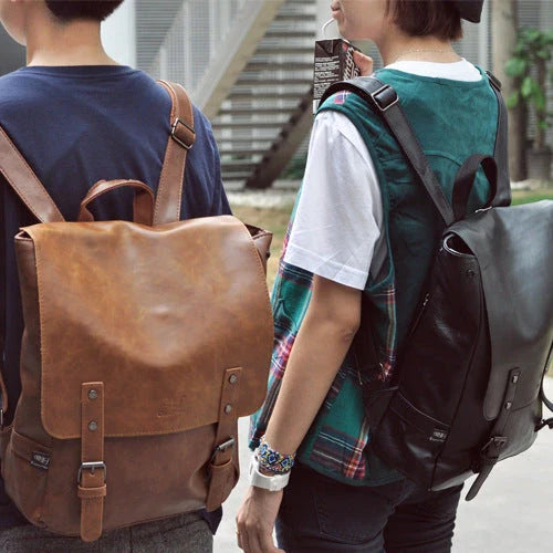 Durable PU leather backpack with spacious storage and laptop compartment for modern men