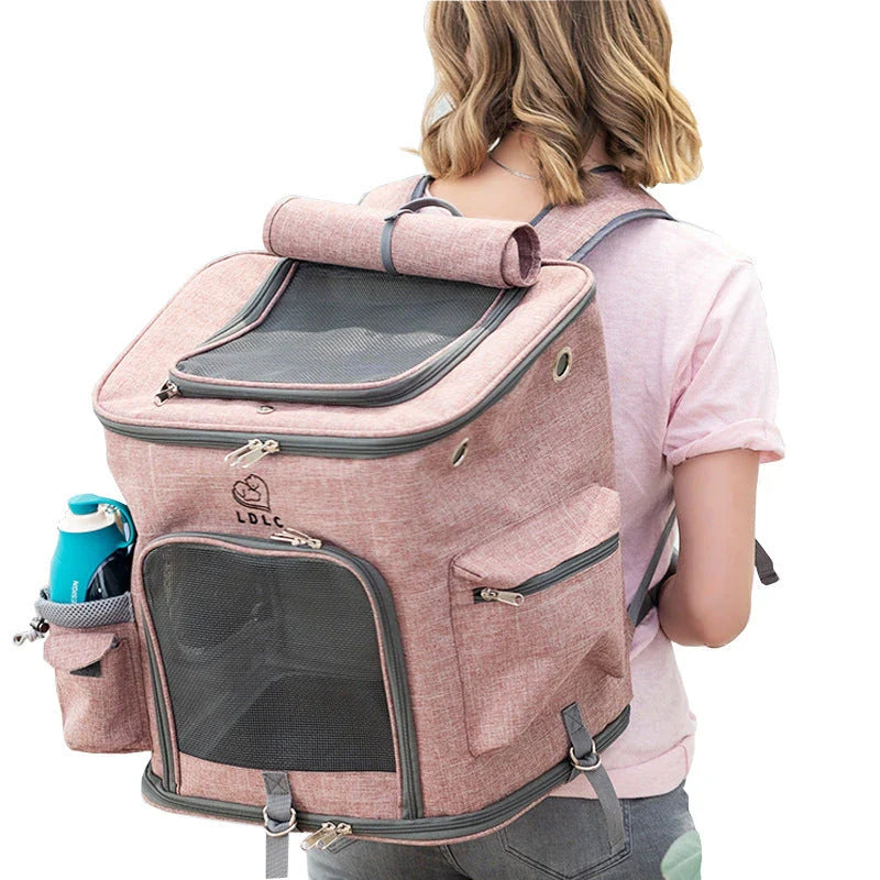 Transparent pet carrier backpack with mesh windows and zippered top for easy access, perfect for transporting cats in comfort and style.