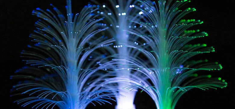 Vibrant color-changing LED fiber optic Christmas tree lamp with stable round base