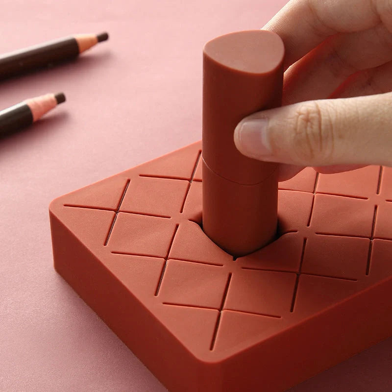 Silicone and ABS lipstick storage rack in red, pink, blue, and grey