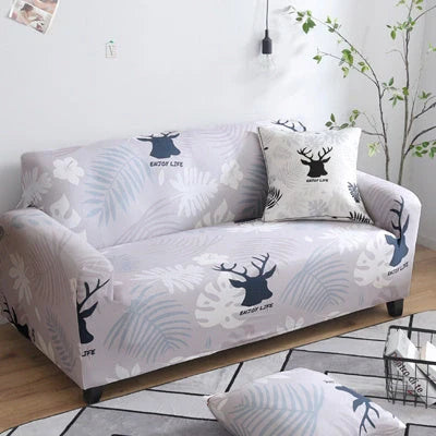 Stretchable geometric print sofa cover on a three-seater sofa