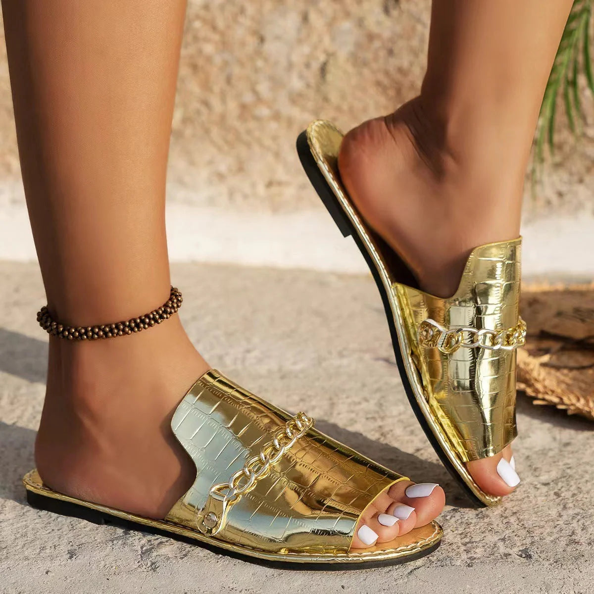 Stylish chain-embellished summer sandals for women featuring a comfortable artificial PU upper and durable rubber soles in a variety of chic colours