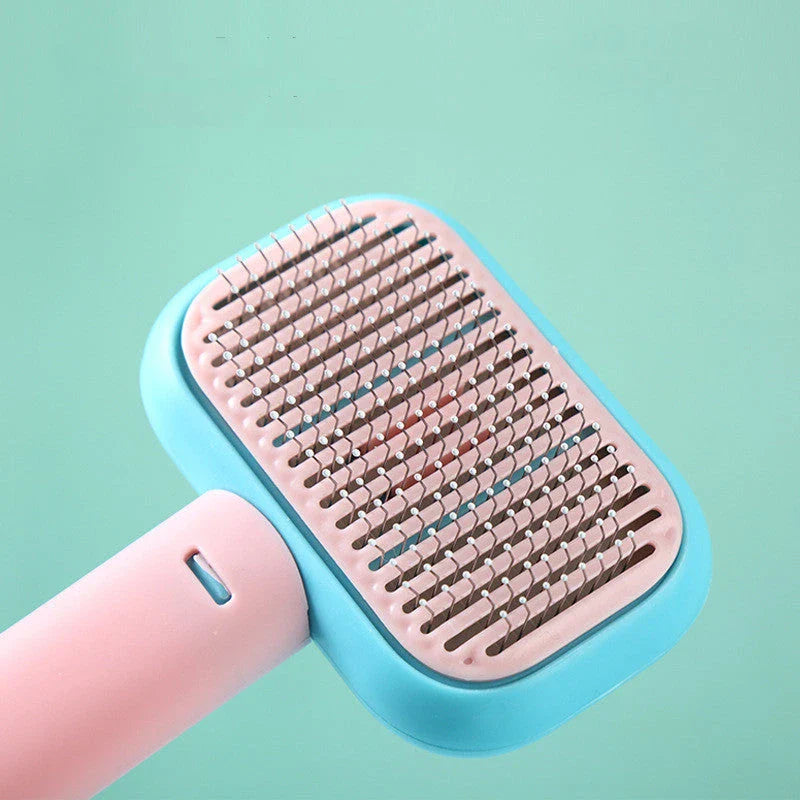 Premium pet hair brush with stainless steel and plastic construction, designed for grooming and massaging cats and dogs