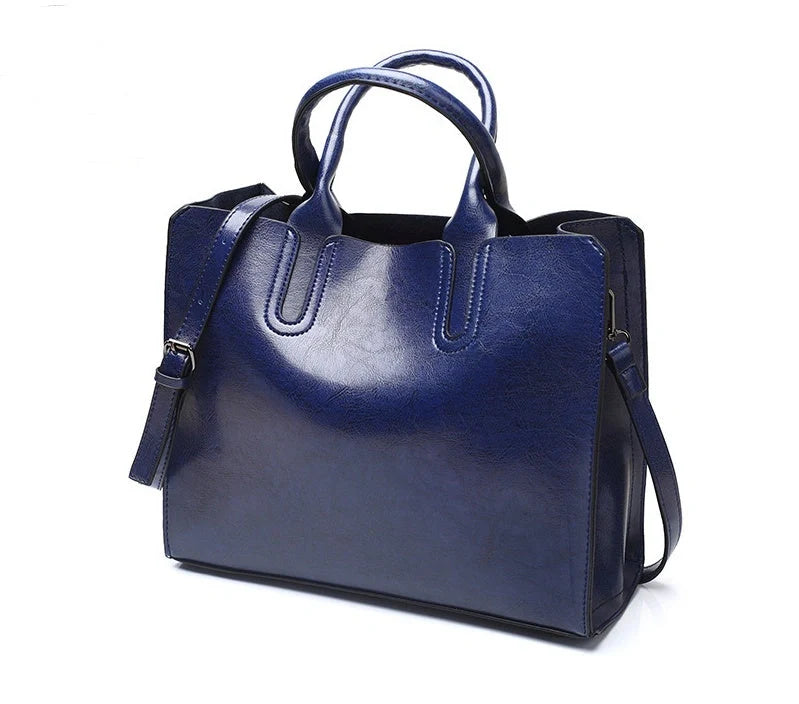 Sofia Spanish Trunk Tote in various colours with multiple compartments and zipper opening