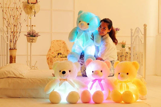 A soft and cuddly teddy bear plush toy with captivating color-changing LED lights, perfect for bringing wonder and delight to a child's room.