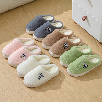 Cozy cartoon-themed slippers for couples, featuring plush material and non-slip rubber soles in a variety of vibrant colors.