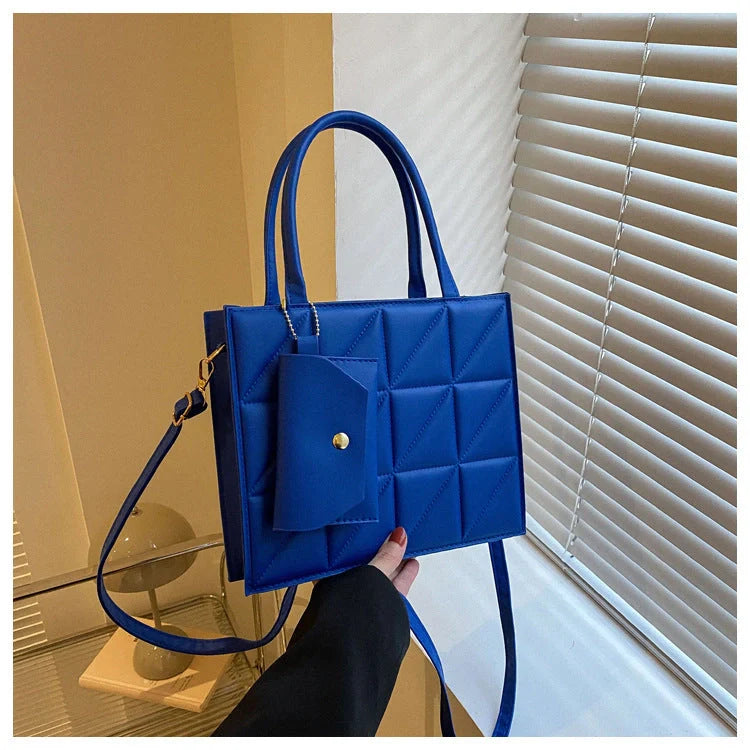 Chic plaid shoulder bag with wallet for women, available in black, white, blue, and green