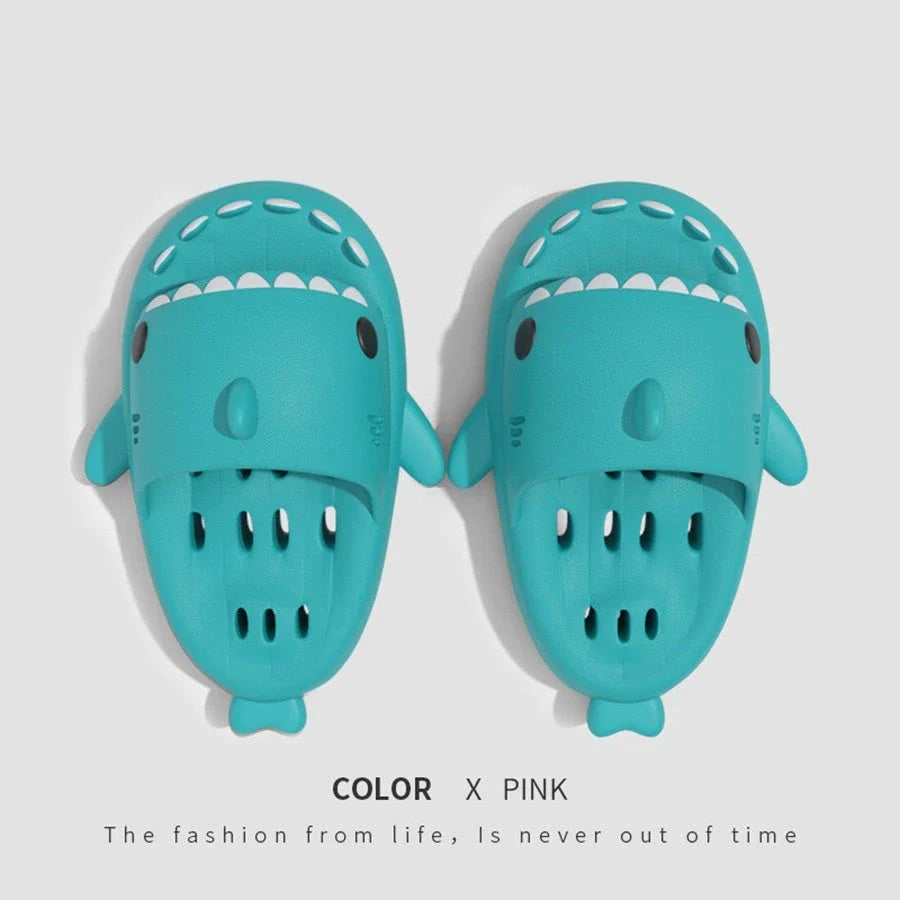 Fashionable shark-themed shower slides with drainage holes, featuring a realistic shark design, quick-drying EVA material, and non-slip traction.