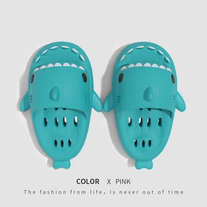Fashionable shark-themed shower slides with drainage holes, featuring a realistic shark design, quick-drying EVA material, and non-slip traction.