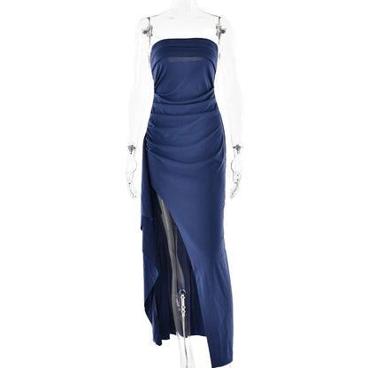 Stunning backless maxi dress in various colors, featuring a pleated A-line skirt and strapless silhouette for elegant occasions.