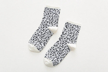 Stylish Dalmatian-inspired cotton crew socks with a premium blend of polyester, spandex, and cotton for all-day comfort and flexibility.