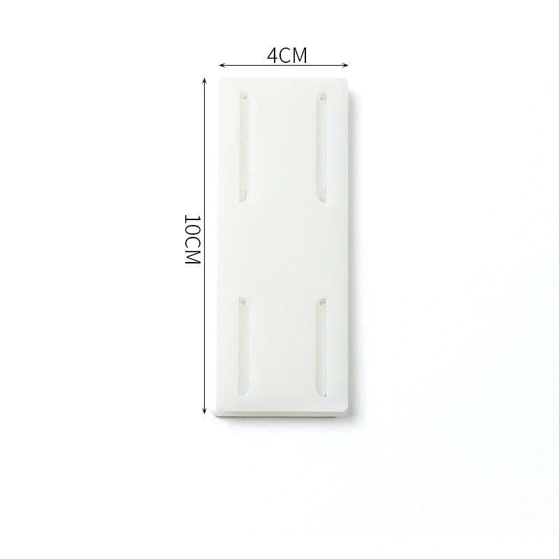 Self-adhesive wall hook in green, blue, white, and pink for cable organisation