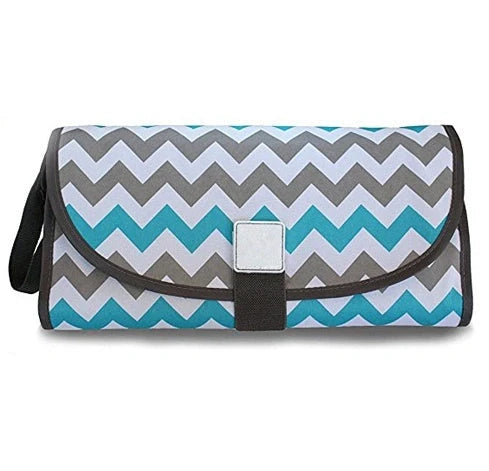Portable diaper changing pad clutch with built-in toy ring, foldable design for easy transport