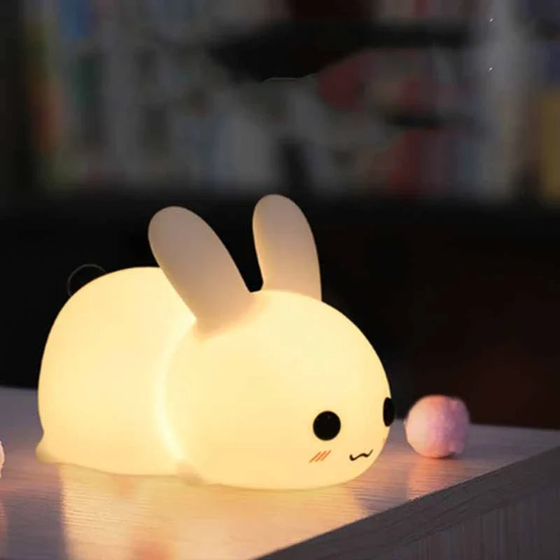 Soft, rabbit-shaped silicone LED night light with dimmable, dual-tone lighting for UK children's bedrooms