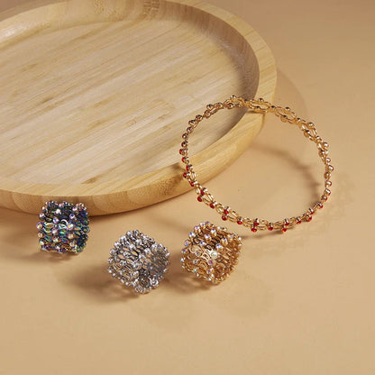2-in-1 folding retractable rings bracelet with rhinestone detail, adjustable design