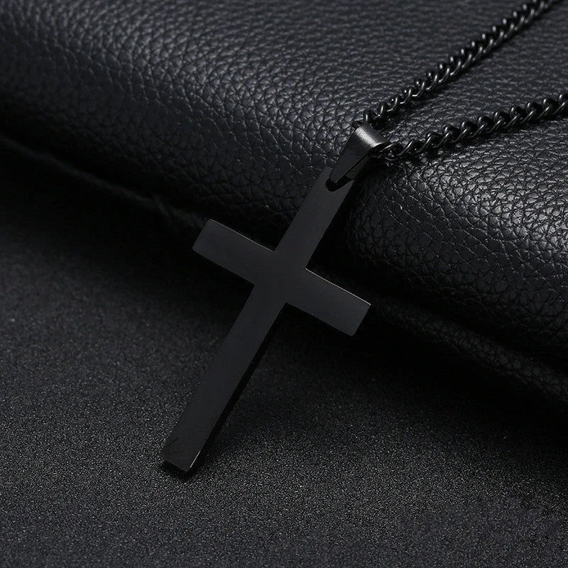 Stainless steel cross pendant necklace in black, silver, and gold colours, showcasing a classic and elegant design