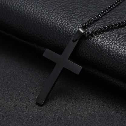 Stainless steel cross pendant necklace in black, silver, and gold colours, showcasing a classic and elegant design