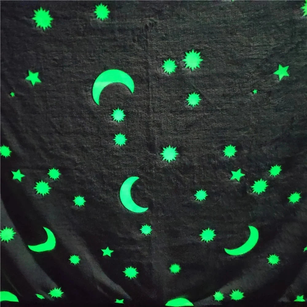 Glowing polyester wool blanket with stars and moons design, perfect for cosy nights