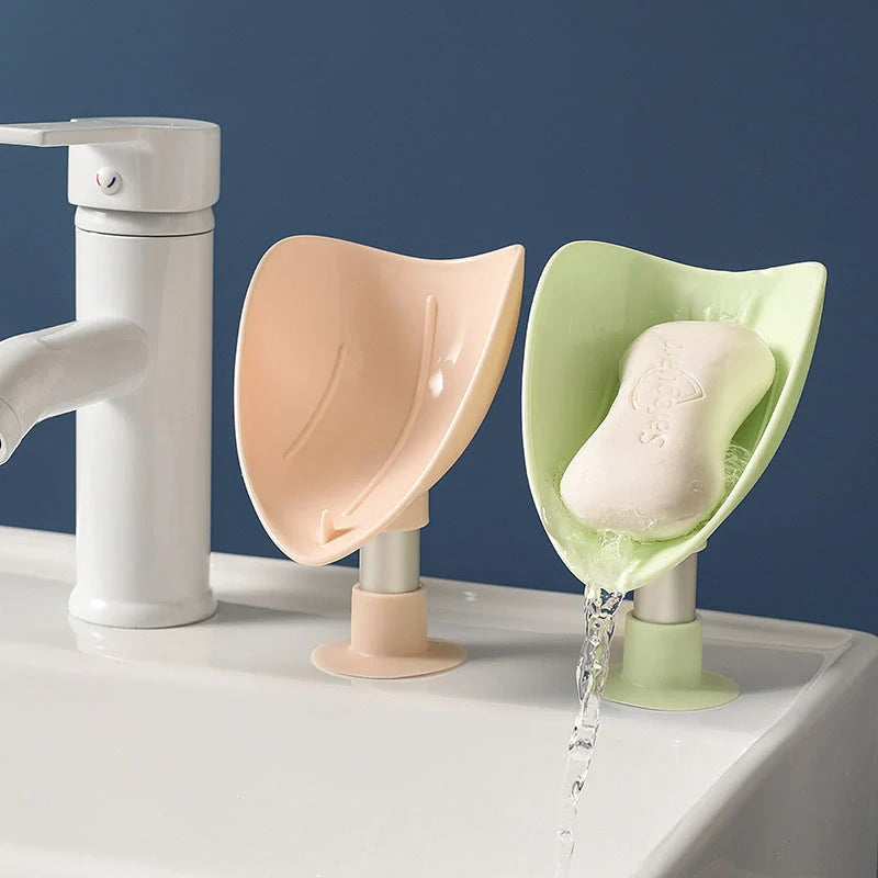 Bird Soap Box with self-draining design and silicone suction cup in white, pink, green, and blue