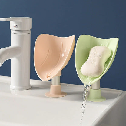 Bird Soap Box with self-draining design and silicone suction cup in white, pink, green, and blue