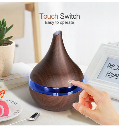 Premium essential oil diffuser with ultrasonic technology, creating a soothing, whisper-quiet mist to elevate your home's ambience