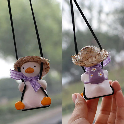 Car Swing Duck Ornament hanging from rearview mirror