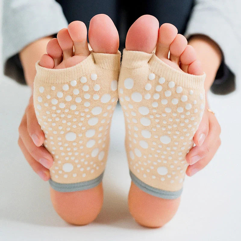 Premium non-slip yoga socks for women featuring split-toe design, jacquard knitting, and breathable combed cotton construction