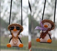Car Swing Duck Ornament hanging from rearview mirror