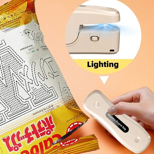 Compact USB mini sealing machine for kitchen food preservation in black and milky white