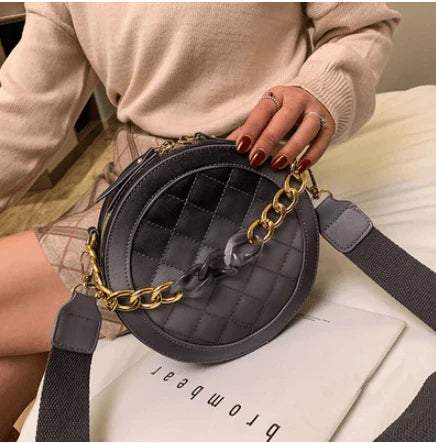A stylish and practical single-shoulder bag made with premium PU leather, featuring a roomy interior and thoughtful organisation.