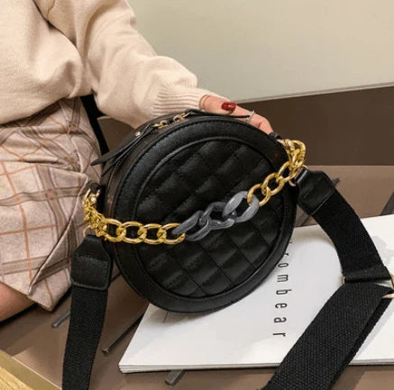 A stylish and practical single-shoulder bag made with premium PU leather, featuring a roomy interior and thoughtful organisation.