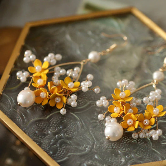 Retro Advanced Atmospheric Flower Earrings in White, Black, and Gold Colours