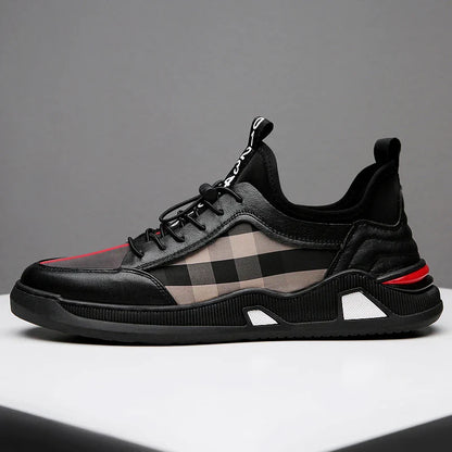 A pair of men's casual leather shoes with a sleek, lace-up design and a stylish check pattern.