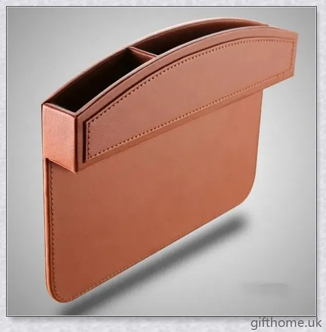 A premium leather and plastic car seat slot storage box for organising mobile phones, keys, and other small items