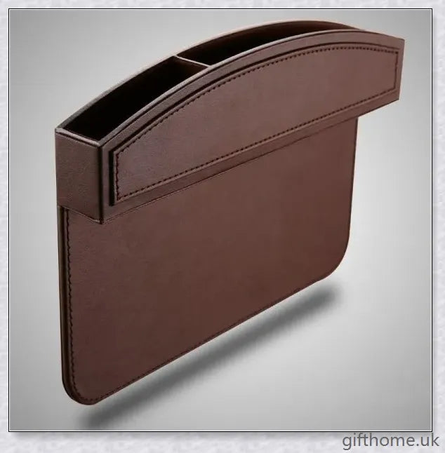 A premium leather and plastic car seat slot storage box for organising mobile phones, keys, and other small items