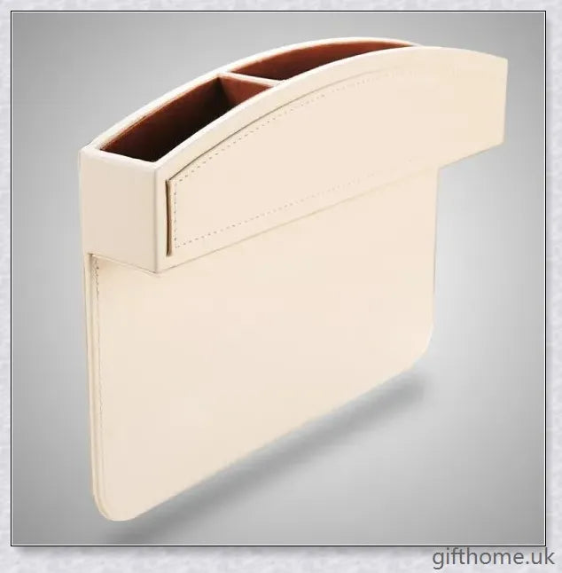 A premium leather and plastic car seat slot storage box for organising mobile phones, keys, and other small items
