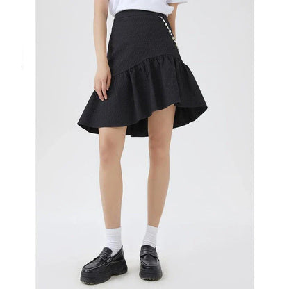Metersbowne Jacquard Swallowtail Half Skirt Shorts in Black, featuring an embossed fabric design and a flattering silhouette for summer style.