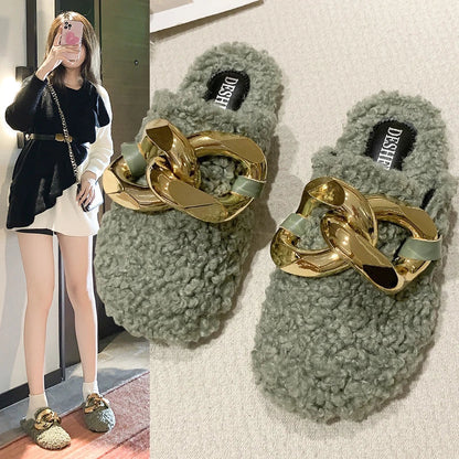 Furry wool mule slippers with a stylish metal chain detail, available in a range of colours to complement any outfit.