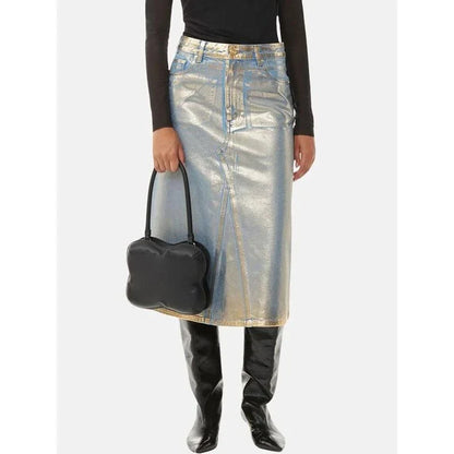 A high-waisted A-line denim skirt with a glossy finish and patchwork pattern, perfect for summer fashion.