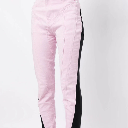 Chic spliced colourblock denim pencil jeans in pink and black, featuring a versatile mid-rise waist and ankle-length cut.