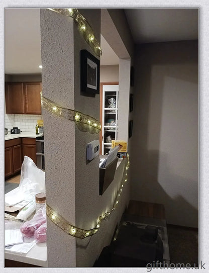 Christmas Ribbon Fairy Lights with warm LED lights, available in gold and silver colours, create a magical holiday ambiance