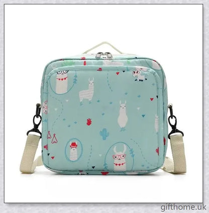 A versatile and stylish baby diaper bag with multiple compartments and soft handles for hands-free carrying.