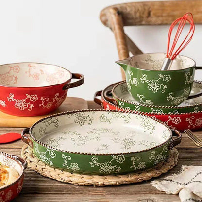 Beautifully hand-painted ceramic baking sheet with a charming cherry blossom design, perfect for even baking and elegant serving.