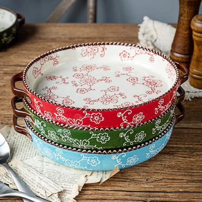 Beautifully hand-painted ceramic baking sheet with a charming cherry blossom design, perfect for even baking and elegant serving.
