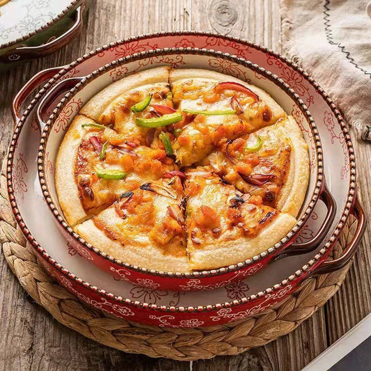 Beautifully hand-painted ceramic baking sheet with a charming cherry blossom design, perfect for even baking and elegant serving.