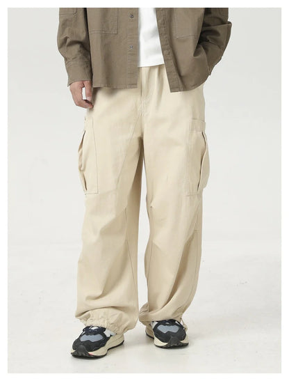 Stylish men's drawstring baggy straight trousers in black and milky white colours